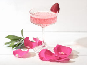 cocktail decorated with rose petal