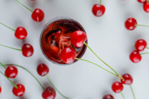 Scattered cherries with cocktail